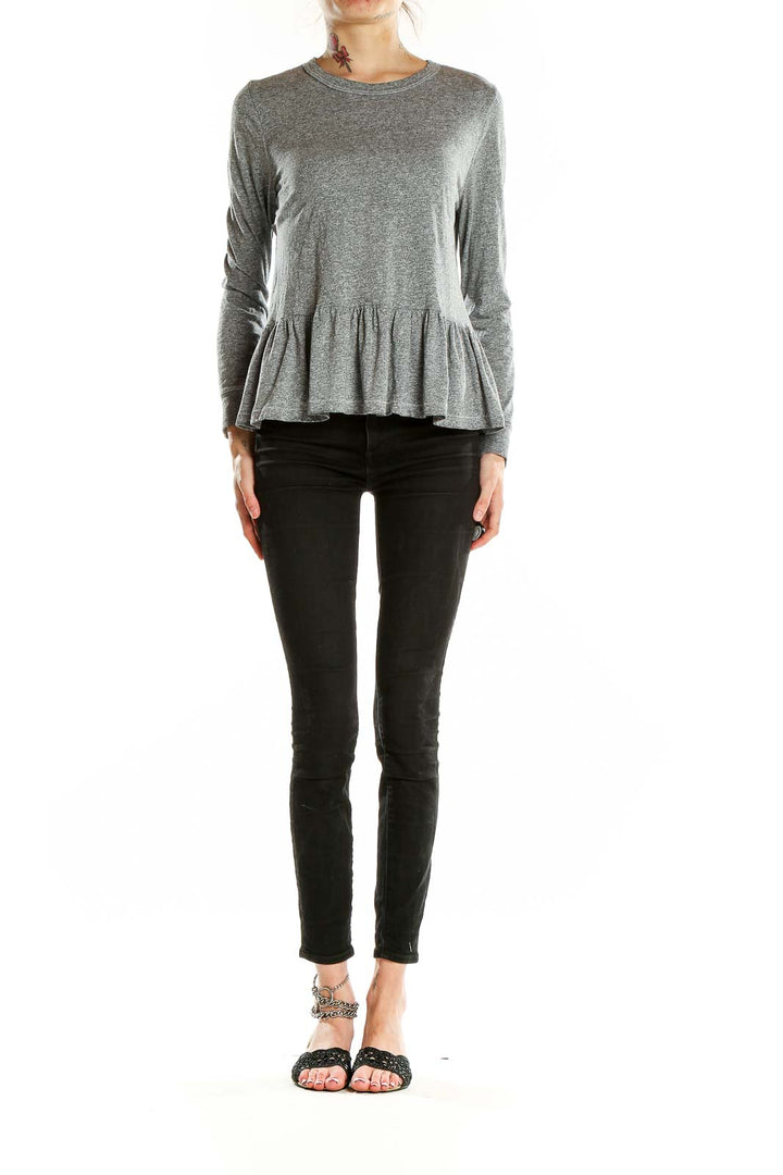 Front view of The Great gray peplum long sleeve top