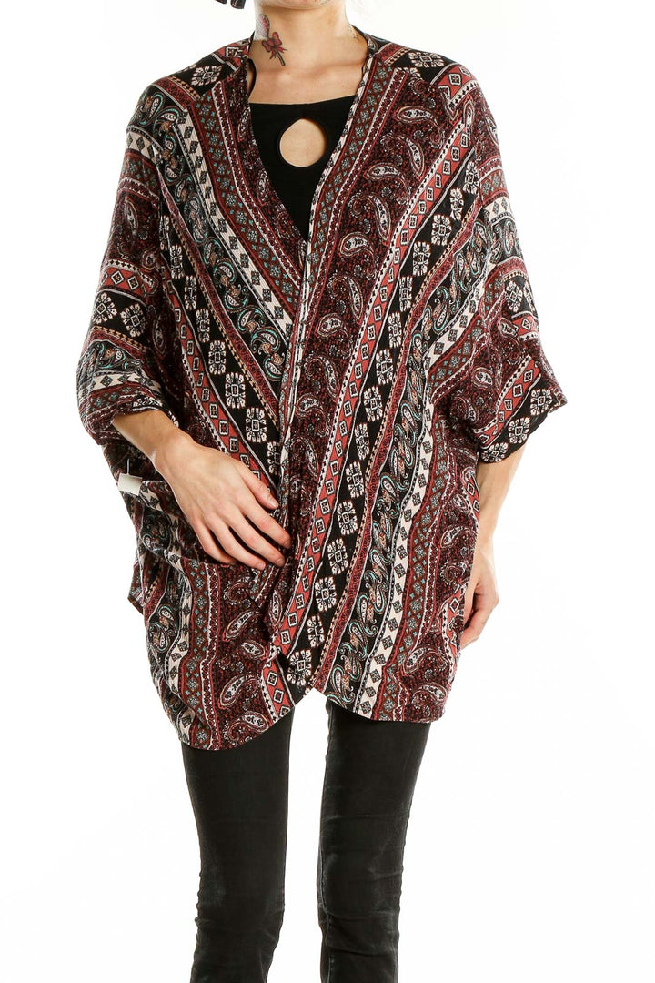 Front view of Altar'd State burgundy paisley striped kimono cardigan on model