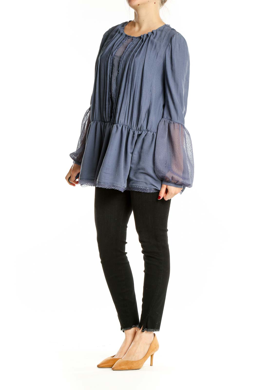 Front view of blue Free People peplum top with sheer sleeves and keyhole detail