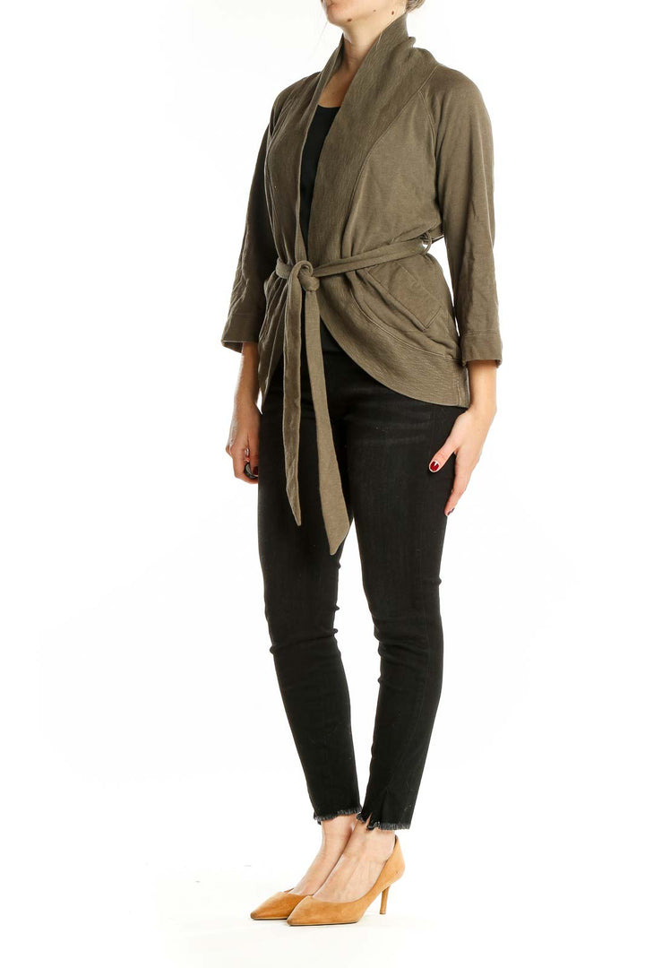 Front view of Banana Republic olive belted wrap cardigan on model