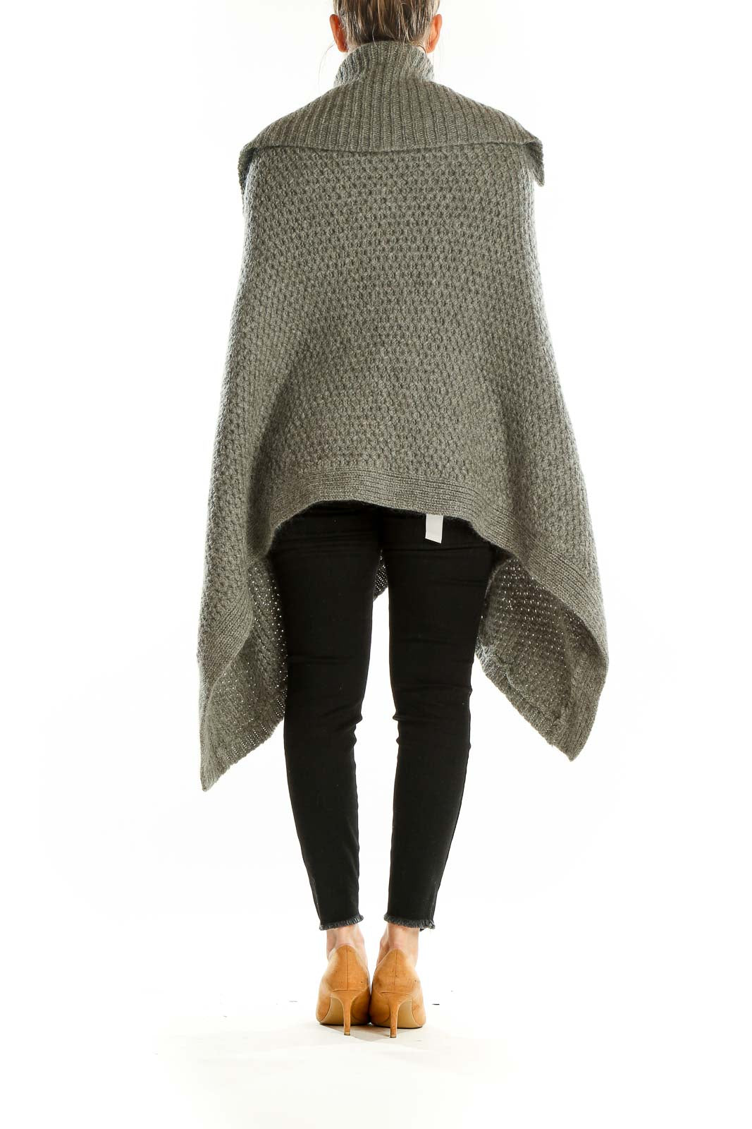 Back view of Moda International gray oversized knit poncho sweater showing drape and length