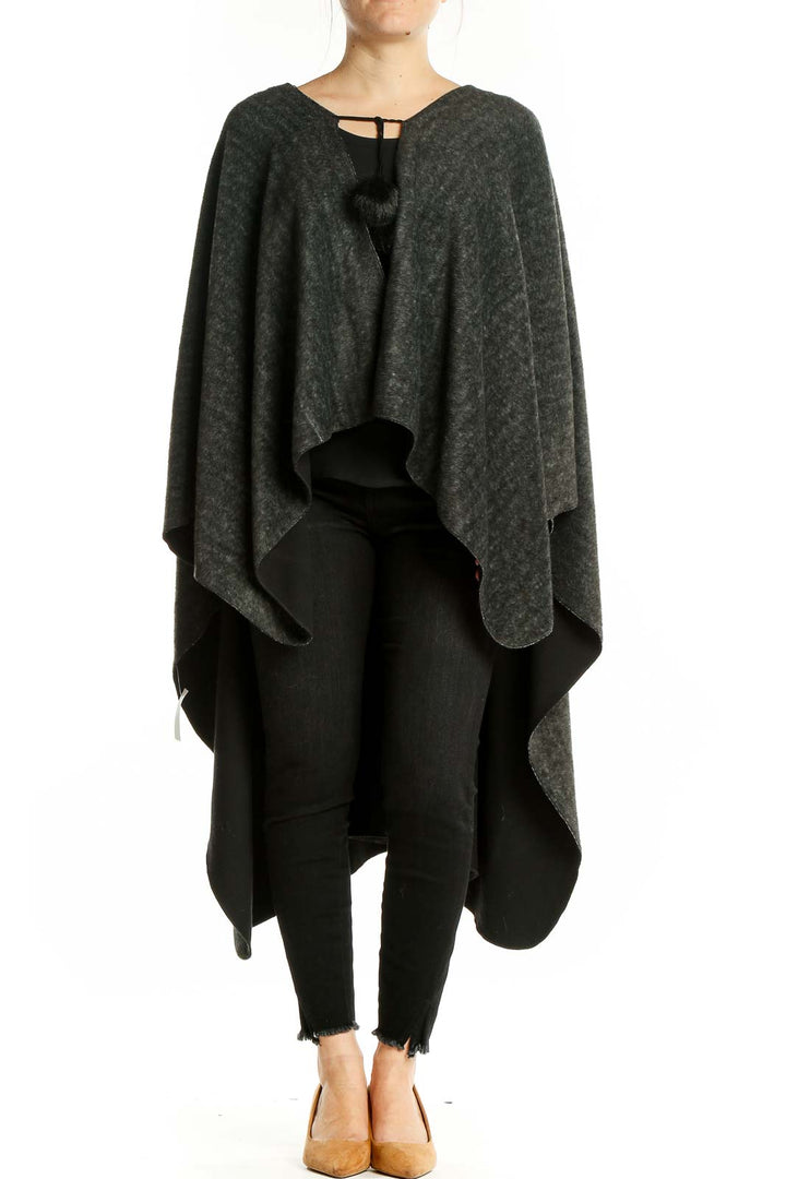 Front view of charcoal gray oversized knit poncho from SilkRoll