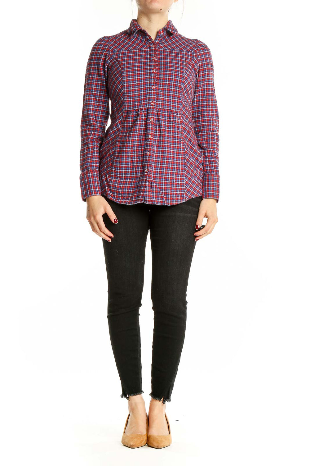 Front view of BDG red plaid cotton button-up shirt on model