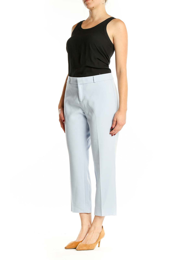 Front view of light blue cropped dress pants from Banana Republic