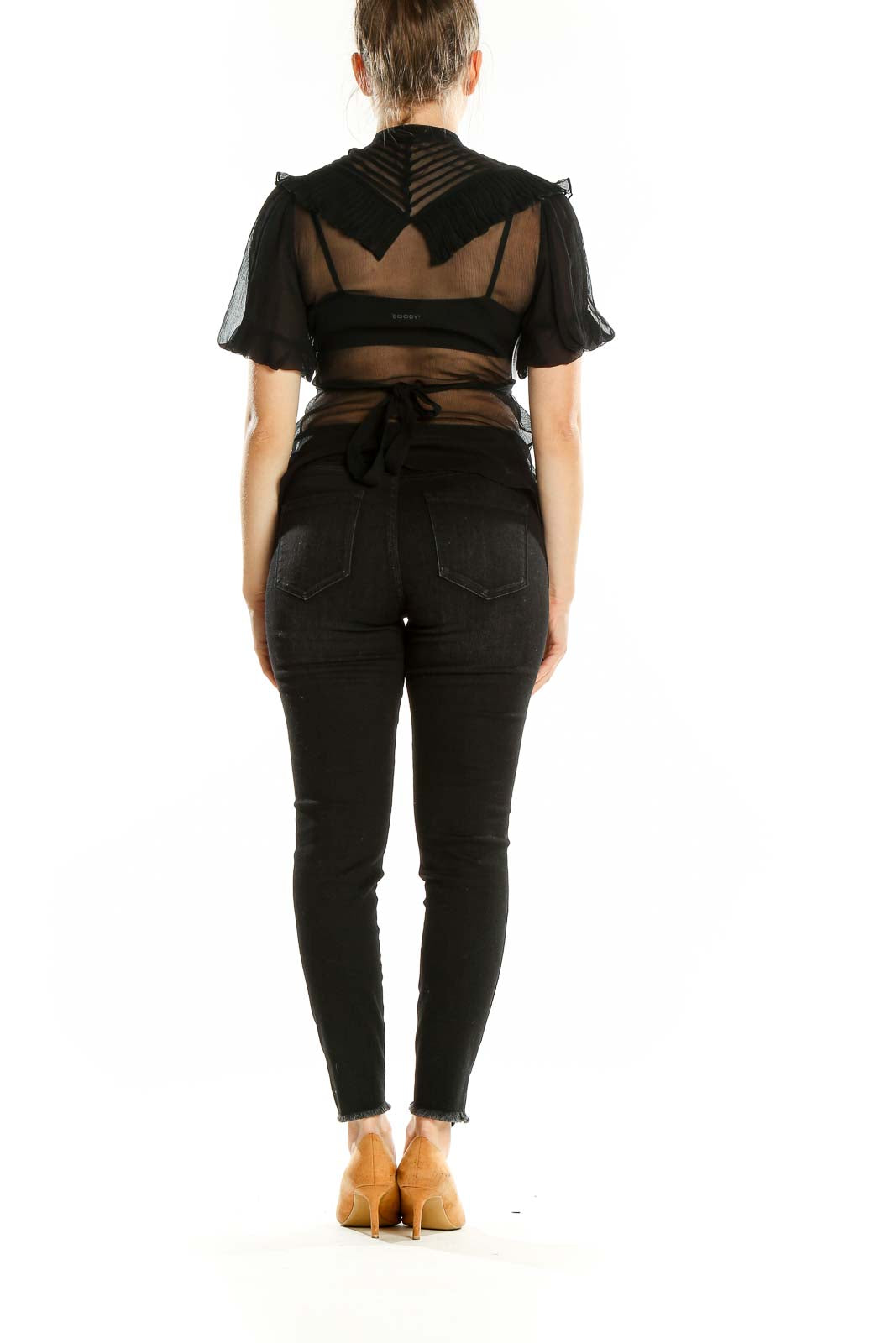 Back view of BCBG MaxAzria black sheer crop top showing transparent design and tie closure