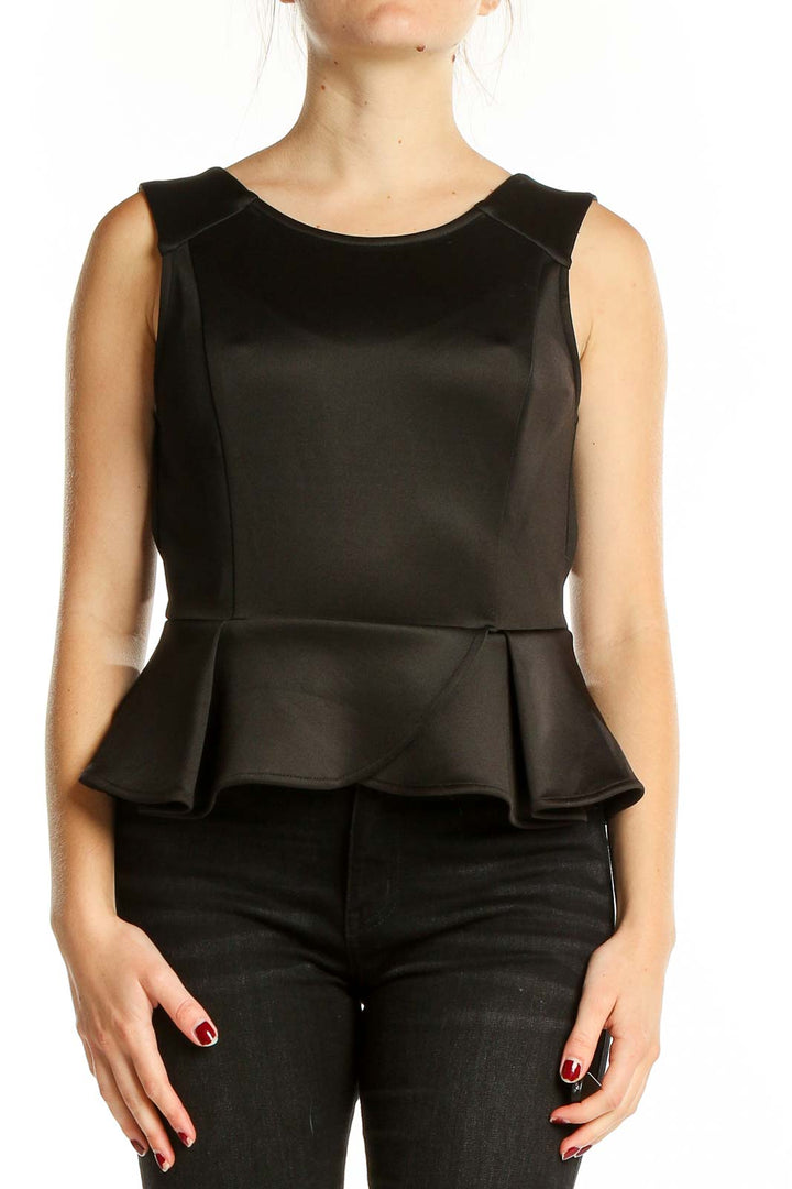 Front view of BCBGeneration black sleeveless peplum top