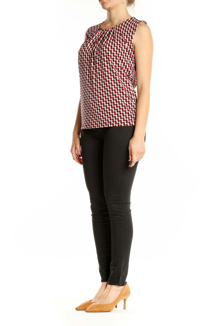 Front view of Calvin Klein red and white geometric print sleeveless top