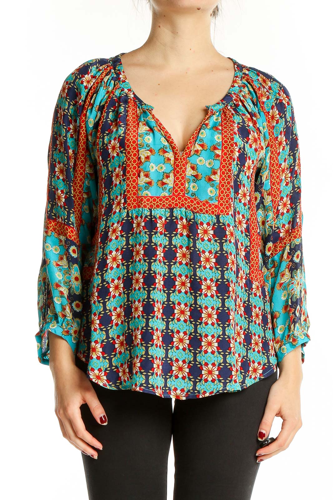 Front view of Tolani turquoise silk blouse with floral print and V-neckline