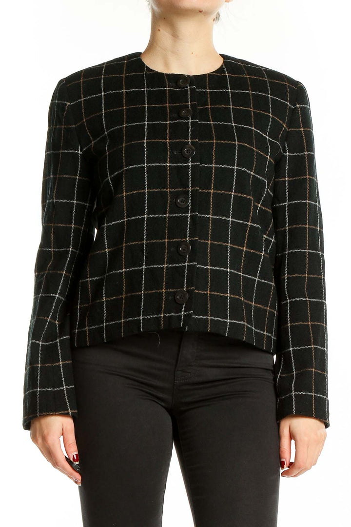 Front view of Clifford & Wills black plaid cropped jacket on model