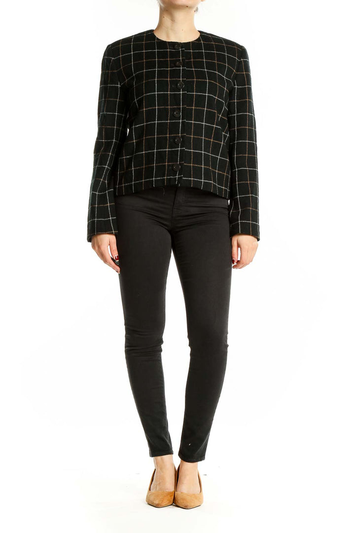 Front view of Clifford & Wills black plaid cropped jacket on model