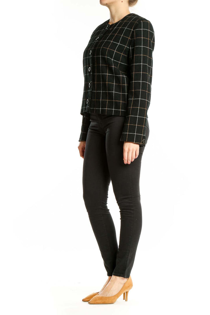 Front view of Clifford & Wills black plaid cropped jacket on model