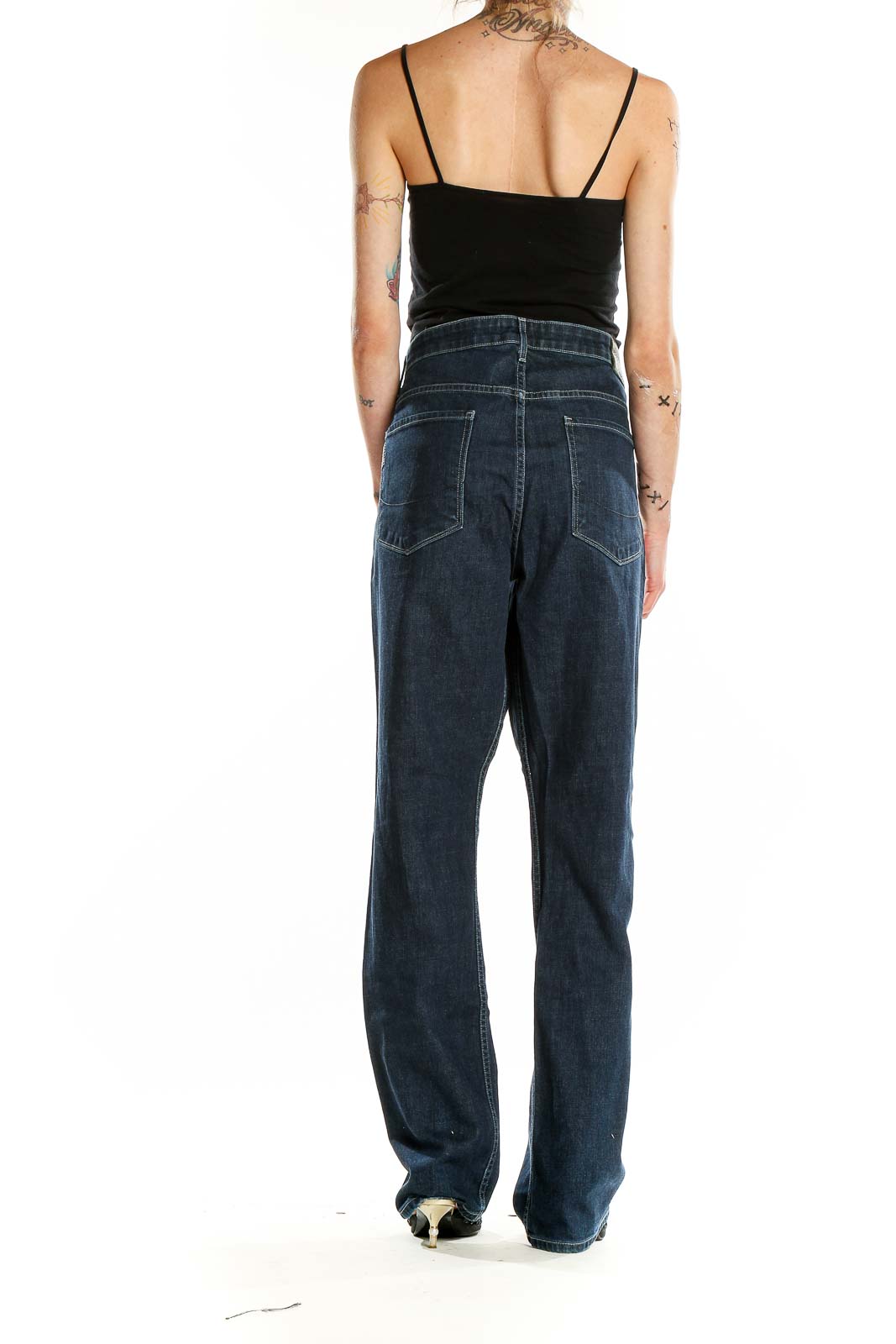 Back view of Paige dark blue wide-leg jeans on model