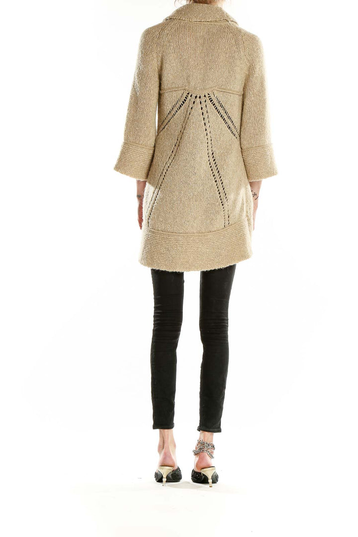 Back view of beige Ann Taylor LOFT shawl collar knit cardigan showing eyelet pattern