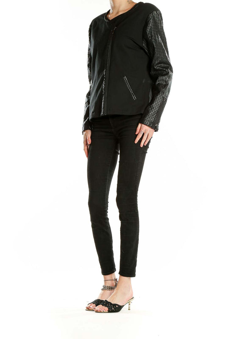 Front view of TART COLLECTIONS black asymmetric zip jacket with mesh sleeves