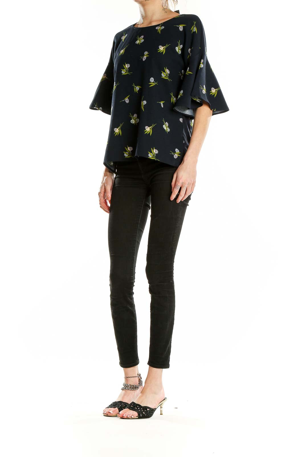 Front view of Ann Taylor black floral print blouse with bell sleeves