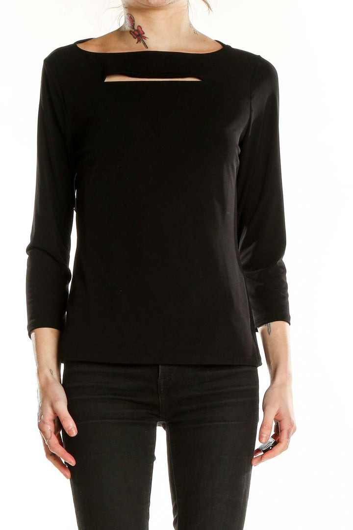 Front view of black Carmen Marc Valvo long sleeve top with neckline cutout