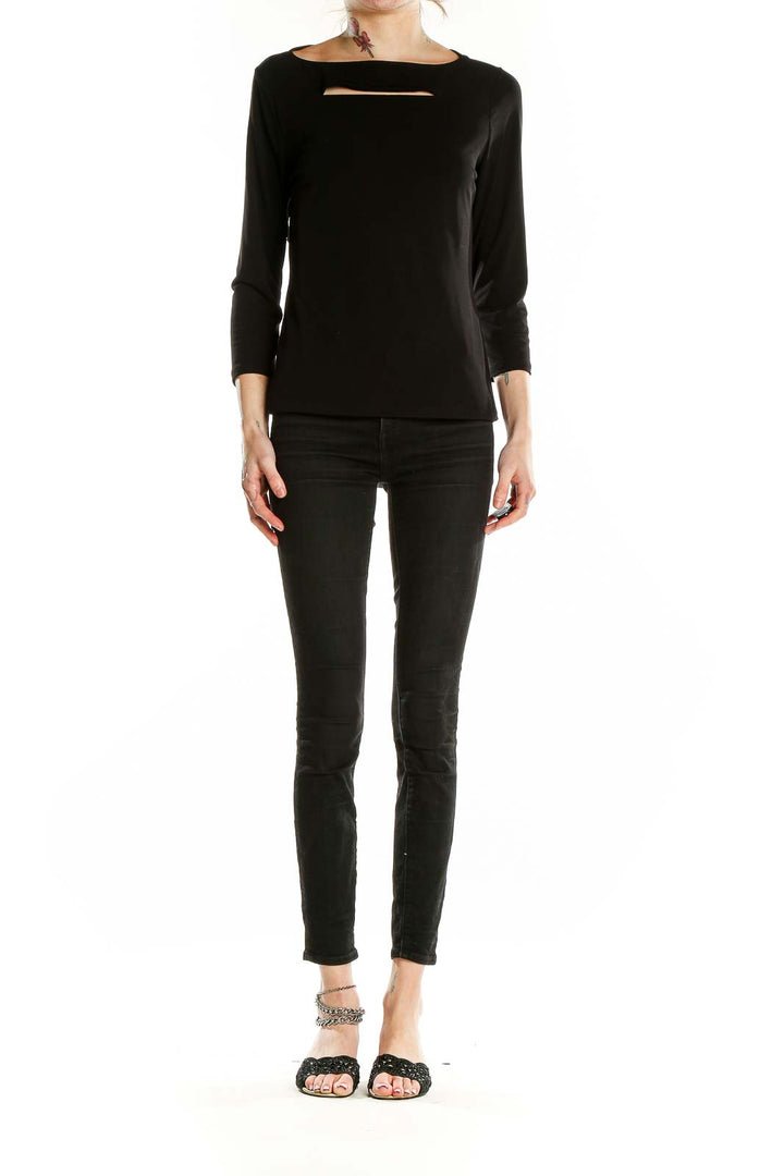 Front view of black Carmen Marc Valvo long sleeve top with neckline cutout