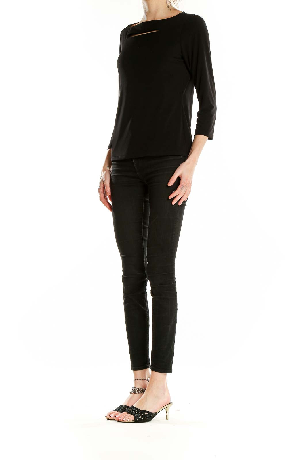 Front view of black Carmen Marc Valvo long sleeve top with neckline cutout