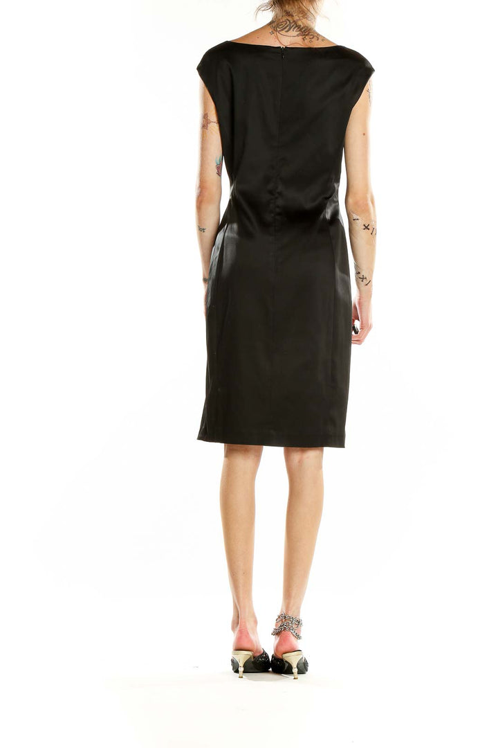 Back view of Lauren Ralph Lauren black satin sheath dress showing sleek silhouette