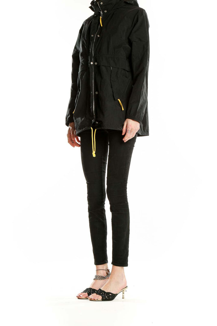 Front view of black Topshop hooded jacket with yellow zipper pulls