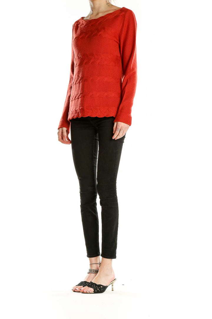 Front view of red Antonio Melani Merino wool sweater with scalloped knit pattern