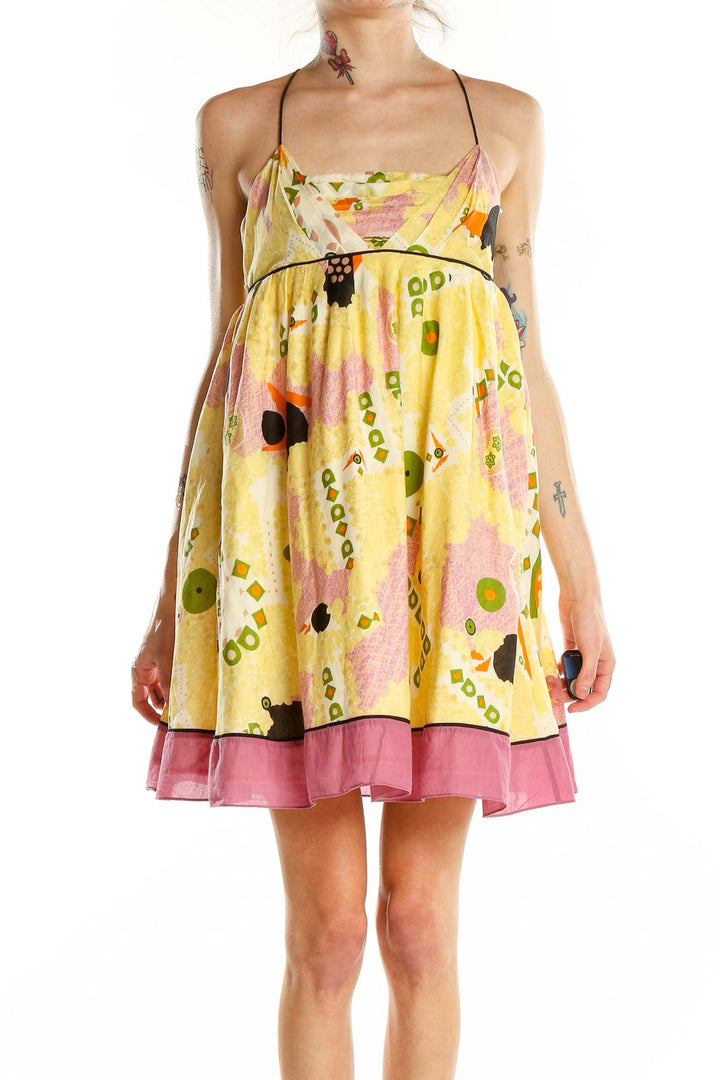 Front view of yellow floral print halter sundress by Catherine Malandrino