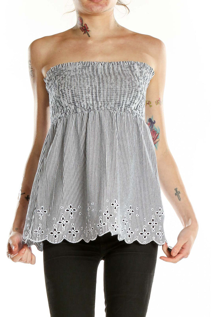 Front view of LOFT gray striped strapless top with eyelet detail