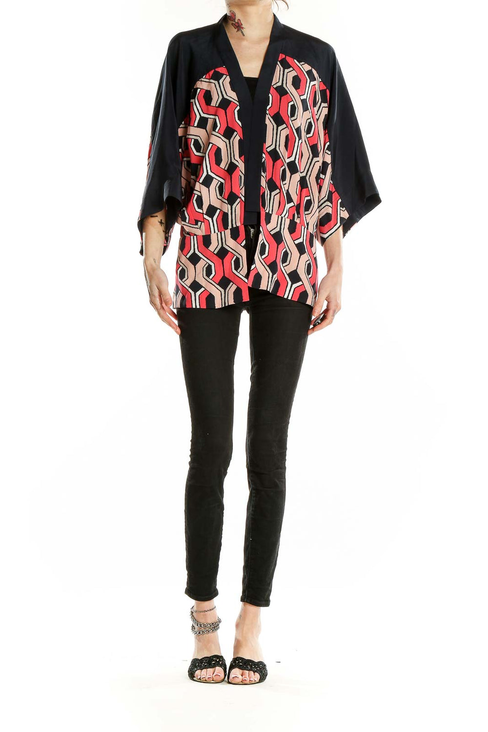 Front view of Trina Turk black, red, and beige geometric print silk kimono top