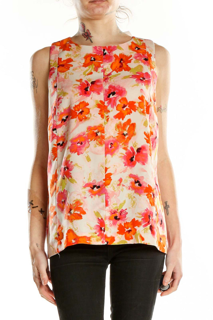 Front view of LOFT orange floral sleeveless blouse on model