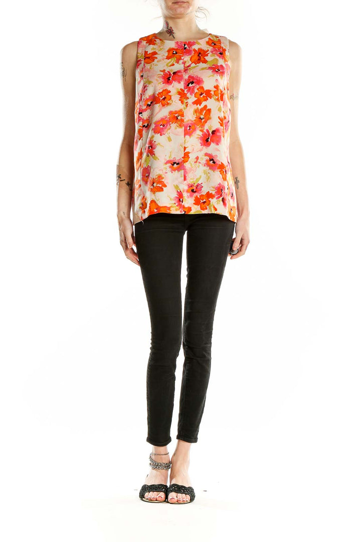 Front view of LOFT orange floral sleeveless blouse on model