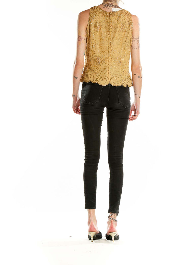 Back view of Jkara golden embroidered sleeveless blouse with zipper closure