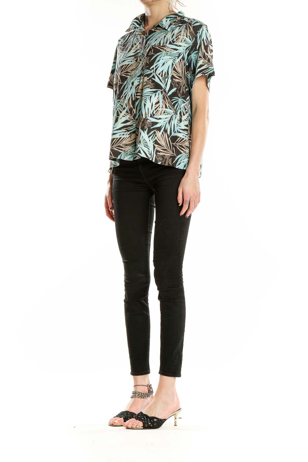 Front view of Columbia teal tropical print short-sleeve button-up shirt