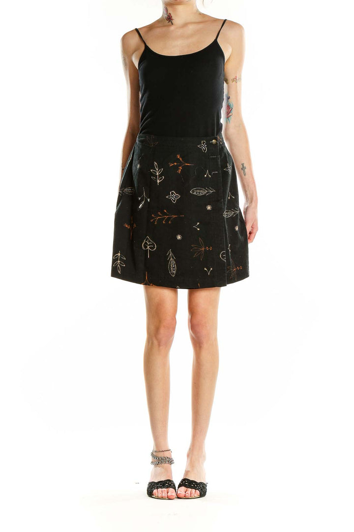 Front view of Talbots black A-line skirt with floral embroidery