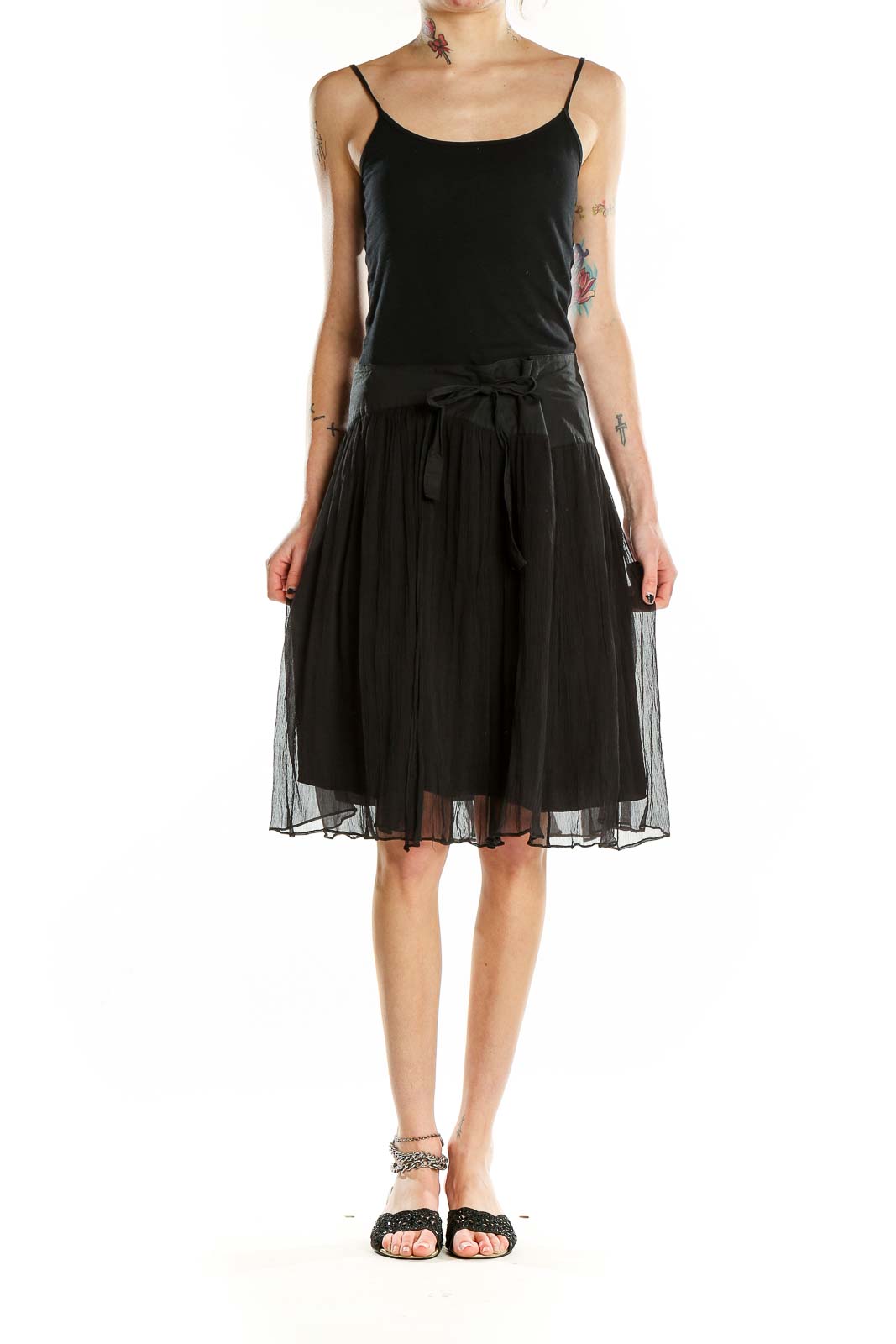 Front view of BCBG MaxAzria black silk tulle midi skirt with bow-tie detail