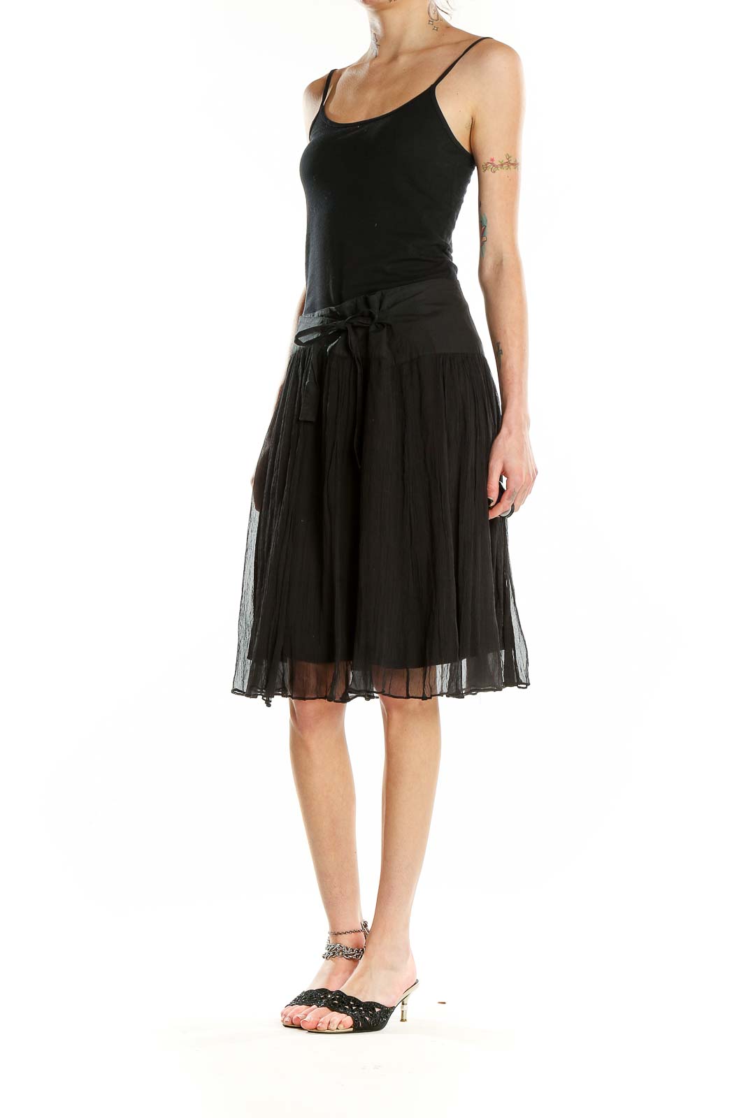 Front view of BCBG MaxAzria black silk tulle midi skirt with bow-tie detail