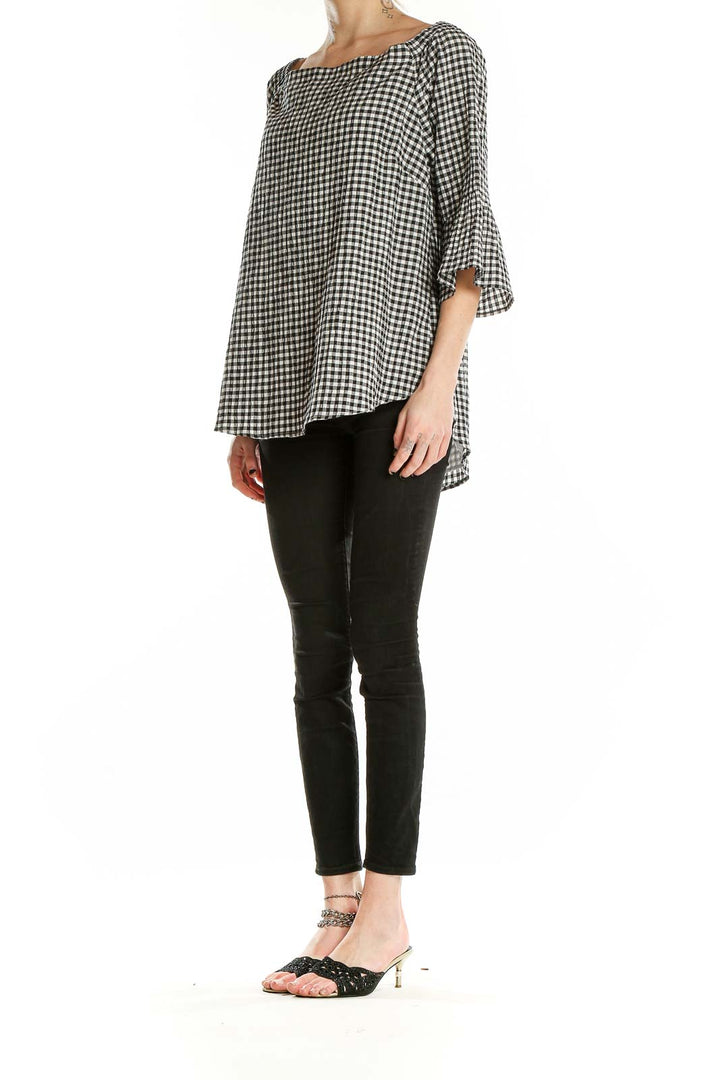 Front view of Black and White Gingham Off-Shoulder Top from White House Black Market