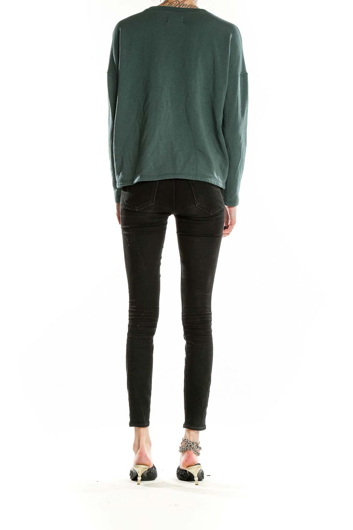 Back view of Madewell forest green relaxed fit long sleeve top