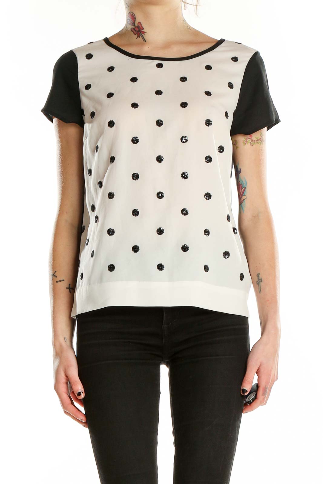 Front view of Coldwater Creek white top with black polka dots and contrasting black sleeves