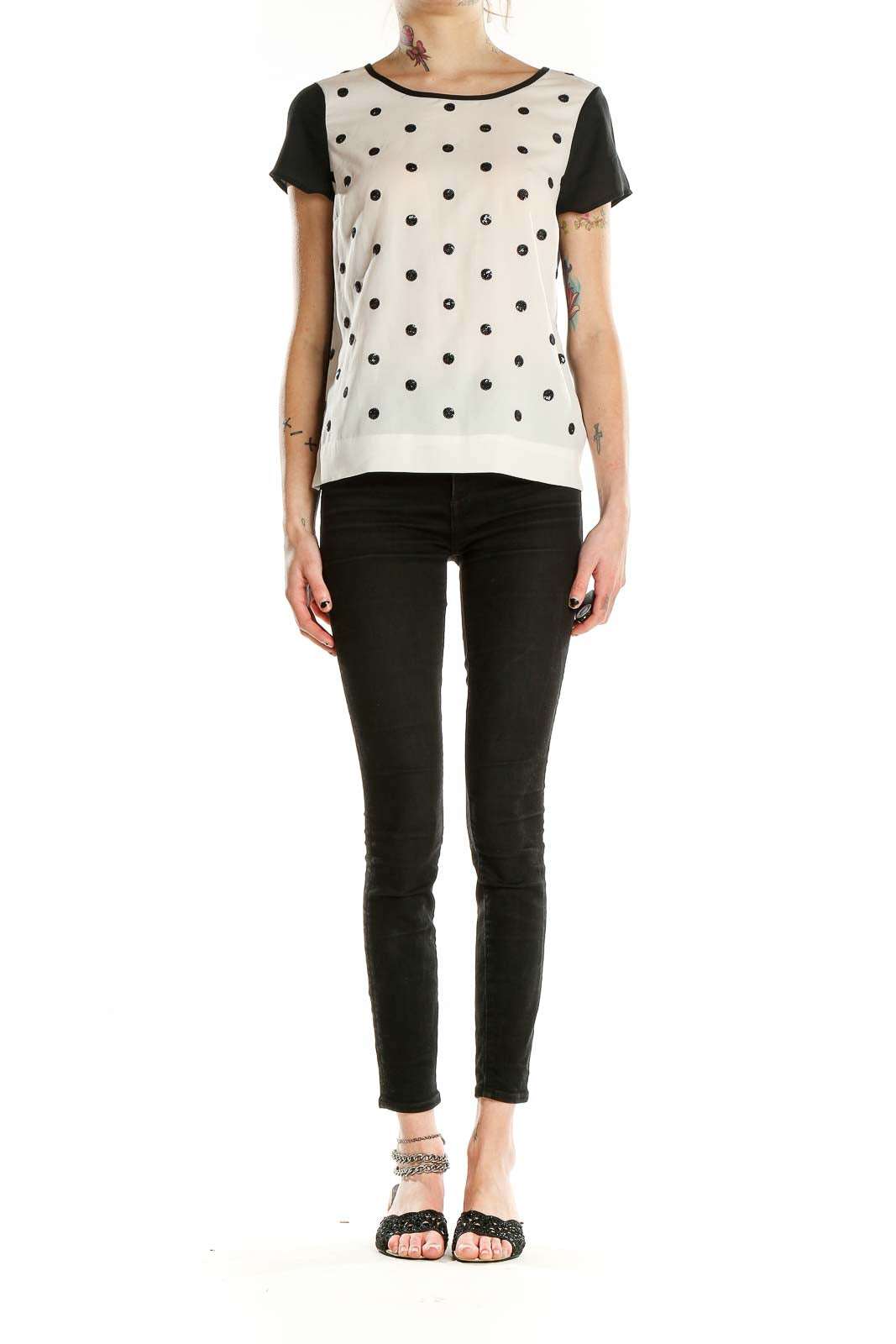 Front view of Coldwater Creek white top with black polka dots and contrasting black sleeves