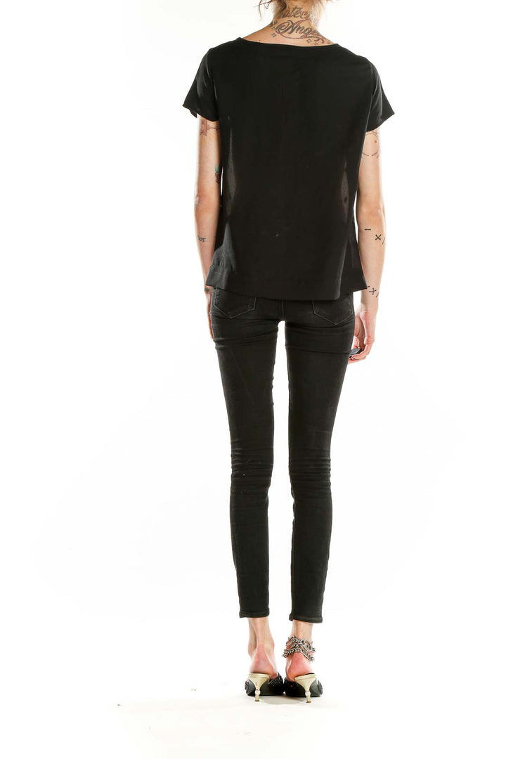 Back view of Coldwater Creek short sleeve top in solid black