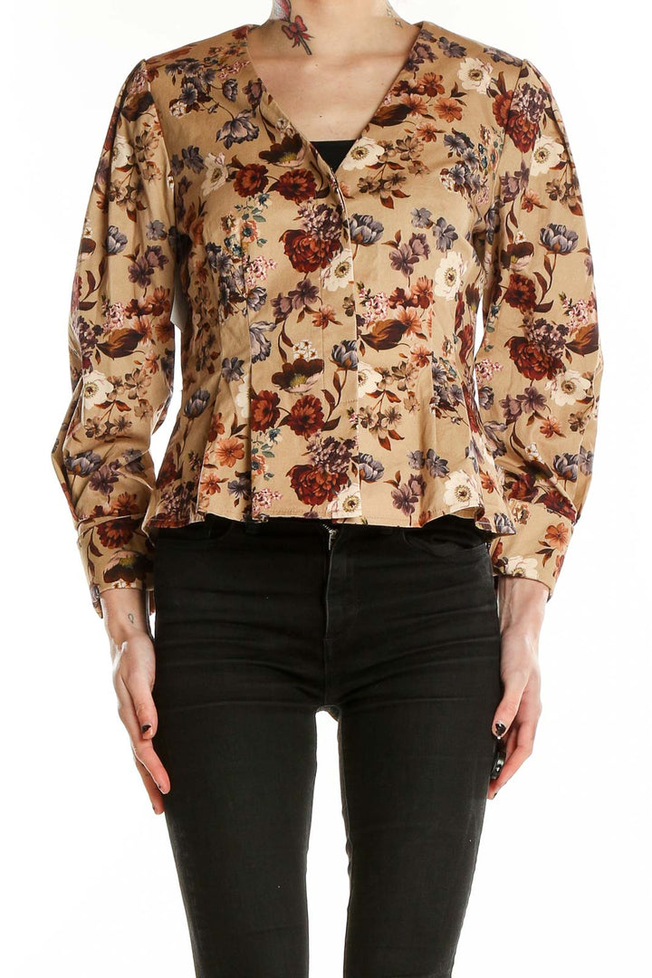 Front view of Antonio Melani beige floral button-up blouse