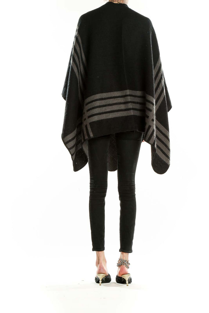 Back view of BB Dakota Black Striped Knit Poncho showing striped pattern