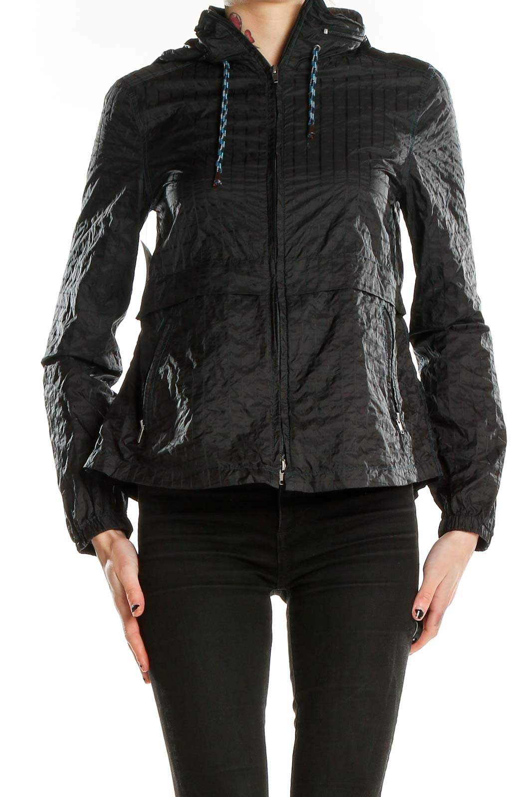 Front view of Free People black quilted nylon jacket with hood