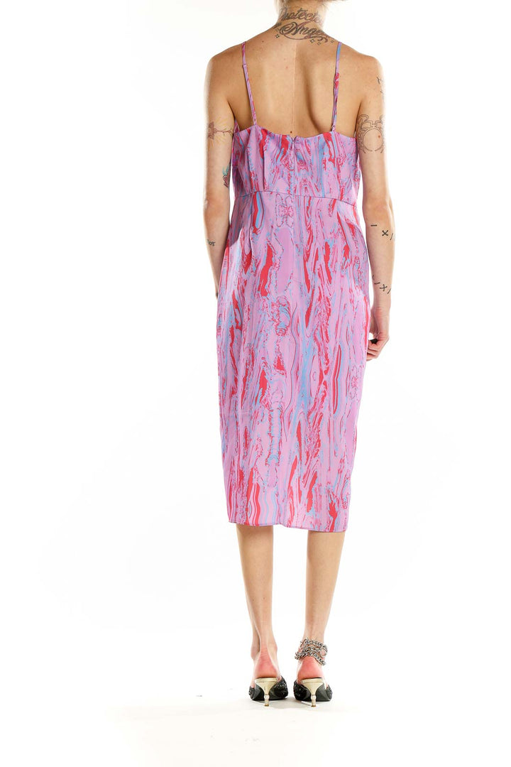 Back view of Chelsea28 Pink Floral Print Midi Dress showing open back design