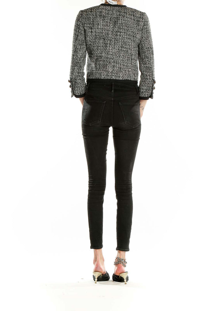 Back view of J.Crew gray tweed cropped jacket on model with black pants