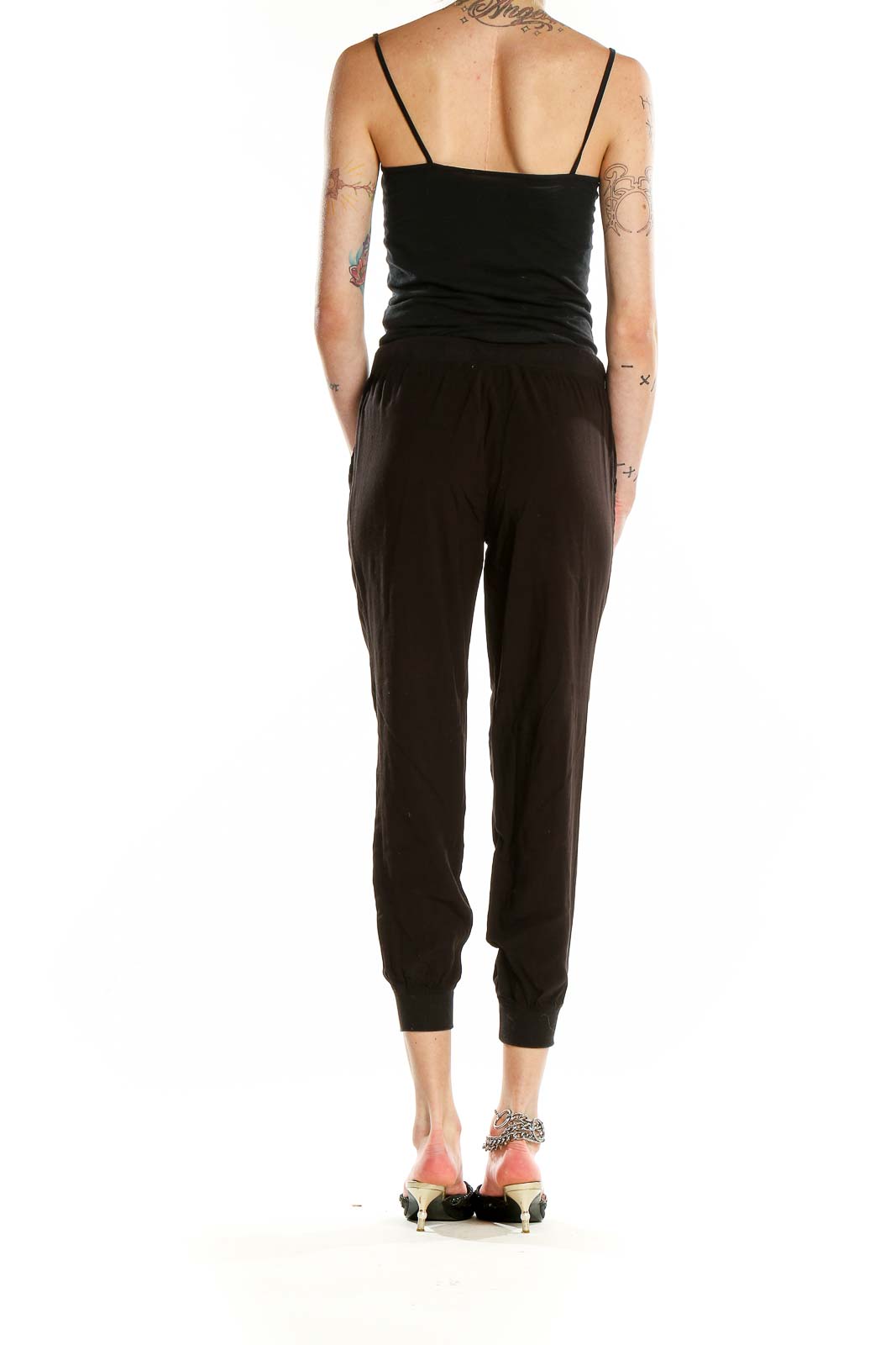 Back view of black cropped jogger pants by M.J.J.P.