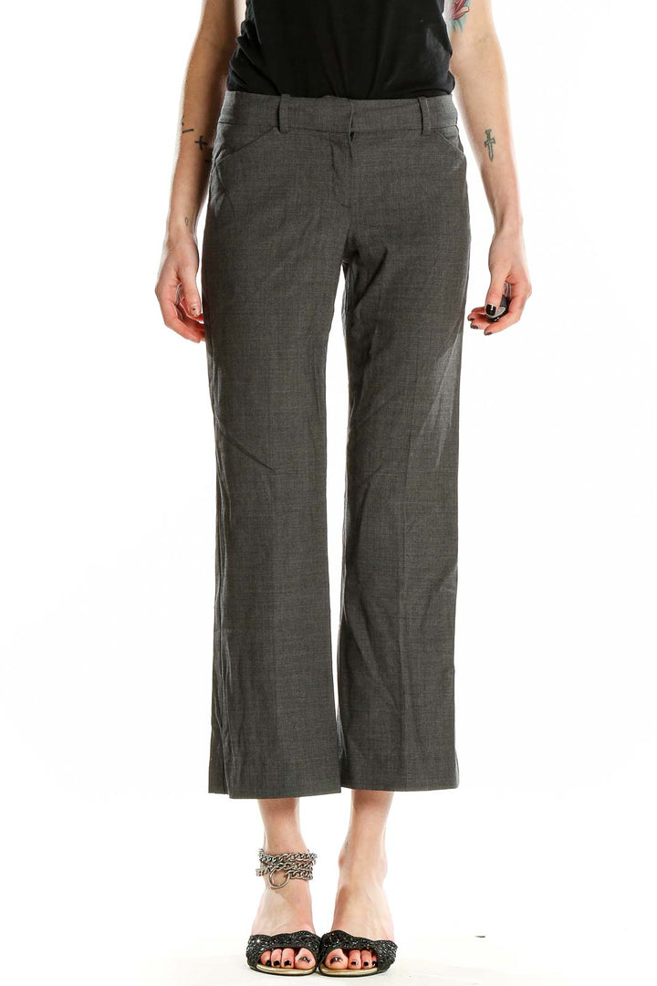 Front view of Theory gray cropped trousers on model