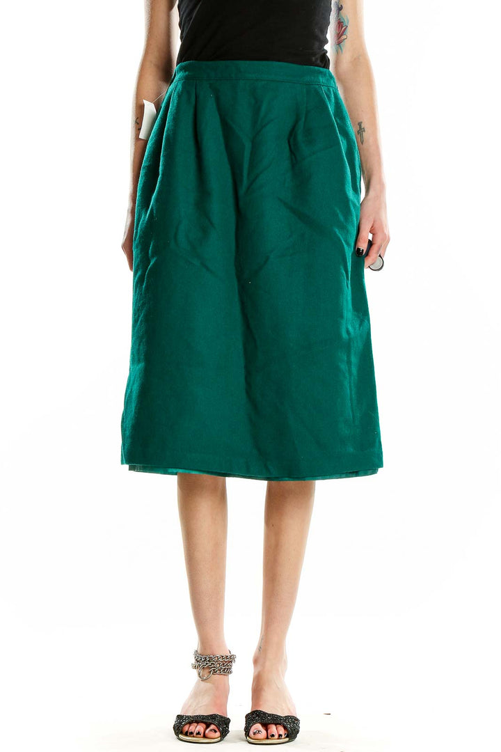 Front view of emerald green wool A-line midi skirt by RUSS