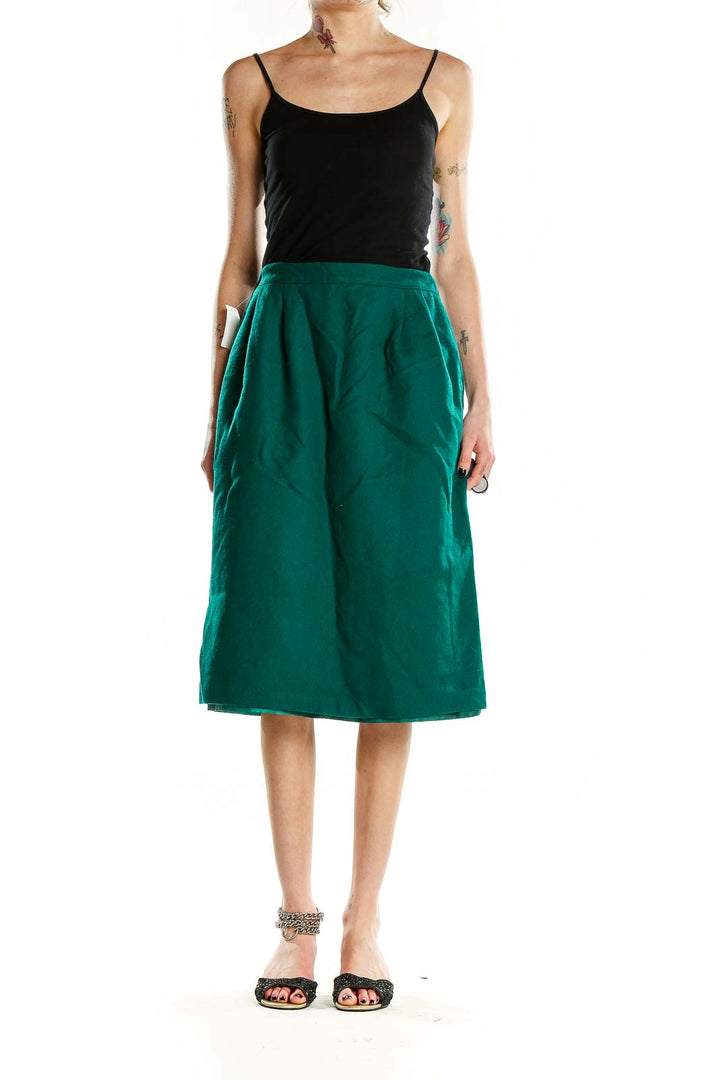 Front view of emerald green wool A-line midi skirt by RUSS