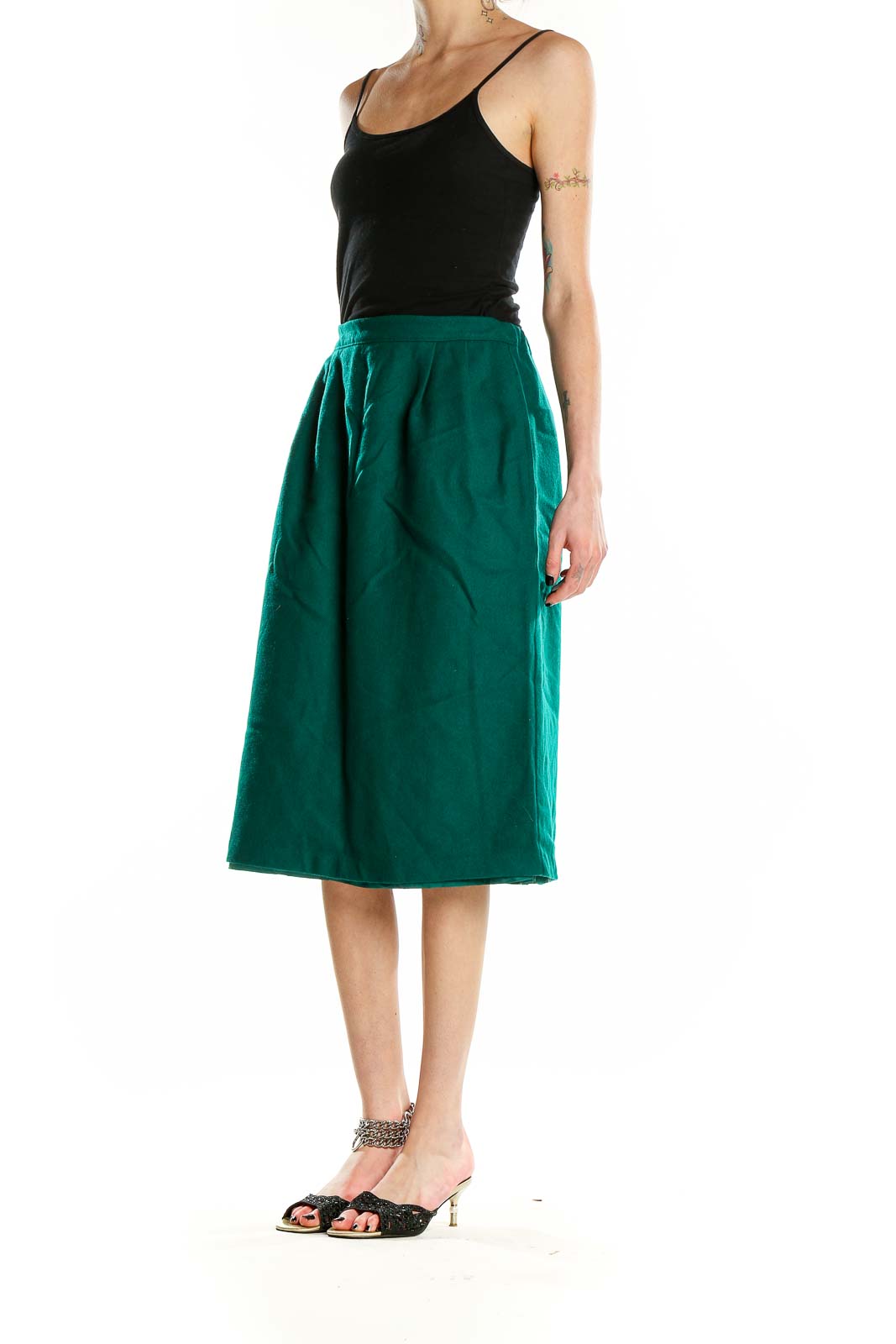 Front view of emerald green wool A-line midi skirt by RUSS